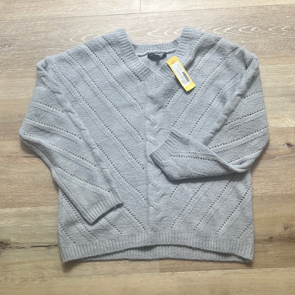 Grey knitted sweater